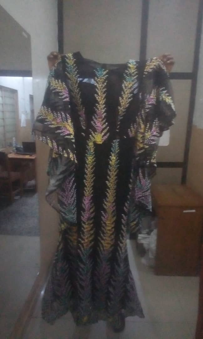 Fully beaded gown with flare sleeve